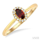5x3 MM Oval Shape Garnet and 1/20 Ctw Round Cut Diamond Halo Semi-Precious Ring in 10K Yellow Gold