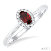 5x3 MM Oval Shape Garnet and 1/20 Ctw Round Cut Diamond Halo Semi-Precious Ring in 10K White Gold