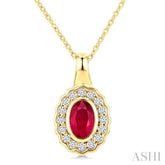 6X4 MM Oval Shape Ruby and 1/6 Ctw Round Cut Diamond Bold Precious Pendant With Chain in 10K Yellow Gold
