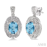 8x6 MM Oval Cut Blue Topaz and 1/50 Ctw Round Cut Diamond Earrings in Sterling Silver