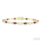 5x3 MM Oval Cut Ruby and 1/10 Ctw Round Cut Diamond Precious Bracelet in 10K Yellow Gold