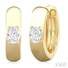 1/6 Ctw Oval Shape Diamond Petite Huggie Earrings in 10K Yellow Gold