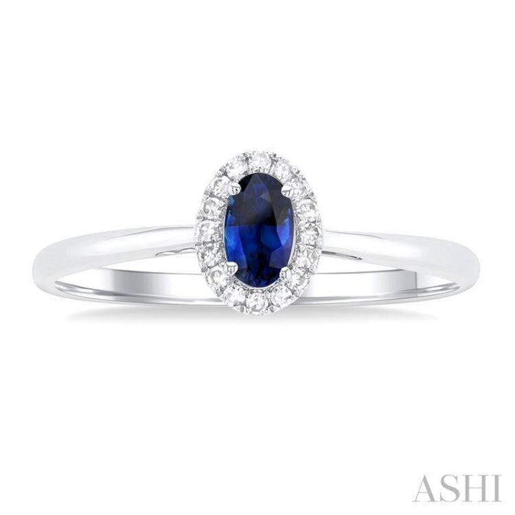 5x3 MM Oval Shape Sapphire and 1/20 Ctw Round Cut Diamond Halo Precious Ring in 10K White Gold