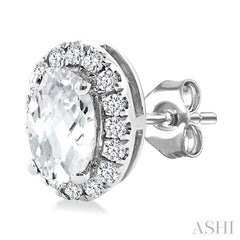 5x3 MM Oval Shape White Topaz and 1/8 Ctw Round Cut Diamond Halo Semi-Precious Stud Earrings in 14K White Gold