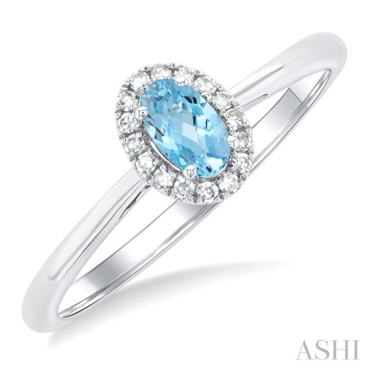 5x3 MM Oval Shape Aquamarine and 1/20 Ctw Round Cut Diamond Halo Semi-Precious Ring in 10K White Gold