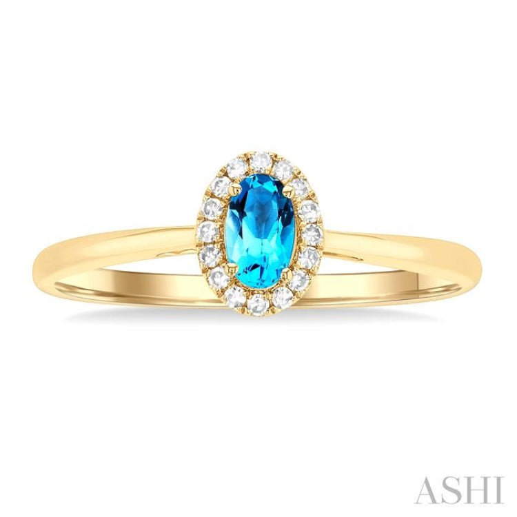 5x3 MM Oval Shape Blue Topaz and 1/20 Ctw Round Cut Diamond Halo Semi-Precious Ring in 10K Yellow Gold