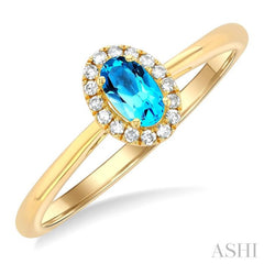5x3 MM Oval Shape Blue Topaz and 1/20 Ctw Round Cut Diamond Halo Semi-Precious Ring in 14K Yellow Gold