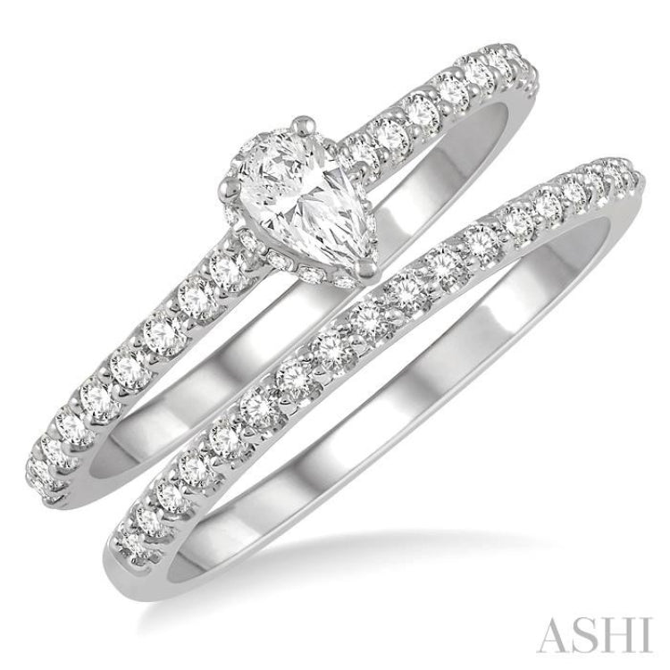 5/8 Ctw Round Cut Diamond Wedding Set With 1/2 Ct Pear Cut 1/4 Ct Center Stone Engagement Ring and 1/6 Ct Wedding Band in 14K White Gold