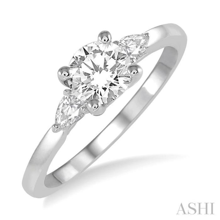 3/4 Ctw Pear and Round Cut Diamond Ladies Engagement Ring With 1/2 Ct Round Cut Center Stone in 14K White Gold