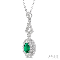 6X4 MM Oval Shape Emerald and 1/5 Ctw Round Cut Diamond Precious Pendant With Chain in 14K White Gold
