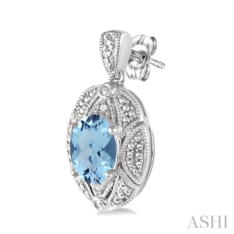 8X6 MM Oval Cut Blue Topaz and 1/50 Ctw Round Cut Diamond Earrings in Sterling Silver