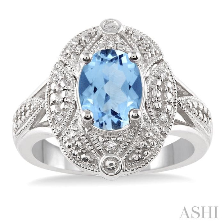 9X7 MM Oval Cut Blue Topaz and 1/50 Ctw Round Cut Diamond Ring in Sterling Silver