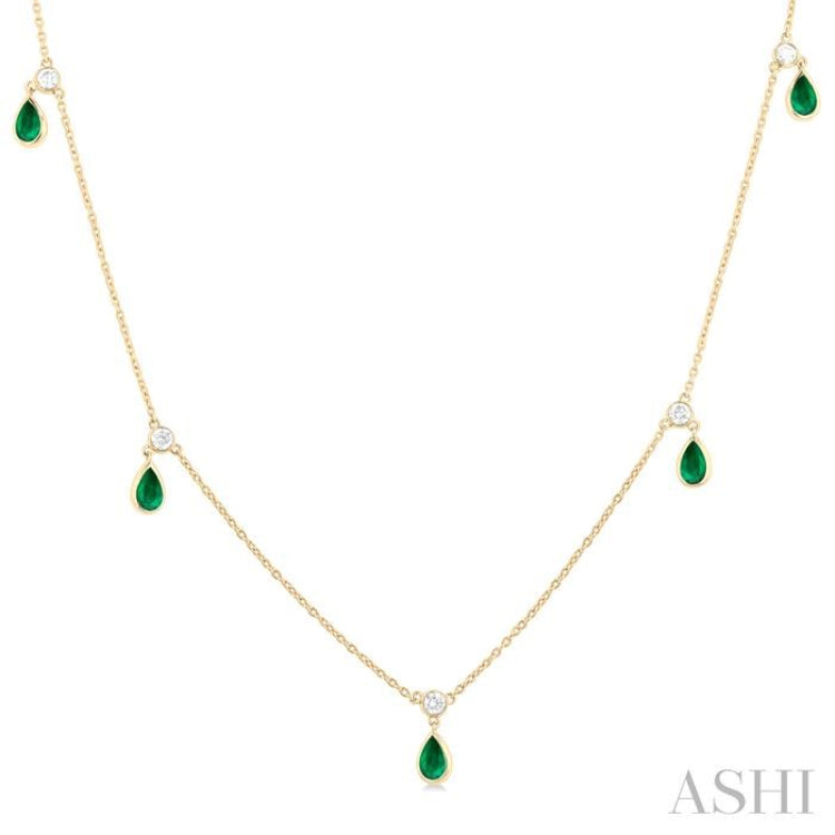 5x3 MM Pear Shape Emerald and 1/4 Ctw Round Cut Diamonds Precious Station Necklace in 10K Yellow Gold