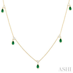 5x3 MM Pear Shape Emerald and 1/4 Ctw Round Cut Diamonds Precious Station Necklace in 10K Yellow Gold