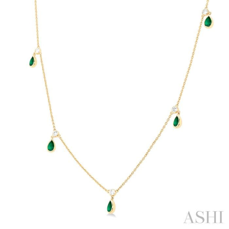 5x3 MM Pear Shape Emerald and 1/4 Ctw Round Cut Diamonds Precious Station Necklace in 10K Yellow Gold