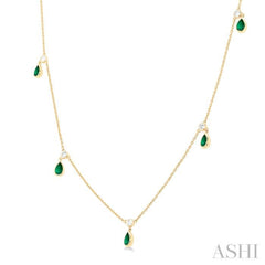 5x3 MM Pear Shape Emerald and 1/4 Ctw Round Cut Diamonds Precious Station Necklace in 10K Yellow Gold