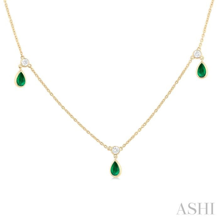 5x3 MM Pear Shape Emerald and 1/4 Ctw Round Cut Diamonds Precious Station Necklace in 10K Yellow Gold