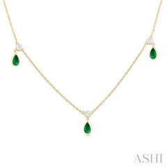 5x3 MM Pear Shape Emerald and 1/4 Ctw Round Cut Diamonds Precious Station Necklace in 10K Yellow Gold