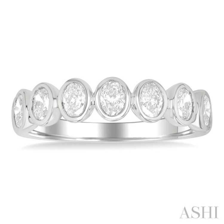 1.00 Ctw 7-Stone Bezel Set Oval Cut Diamond Fashion Band in 14K White Gold