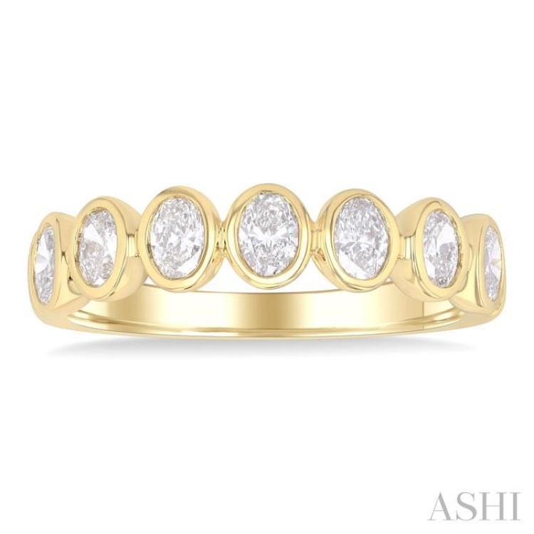 1.00 Ctw 7-Stone Bezel Set Oval Cut Diamond Fashion Band in 14K Yellow Gold