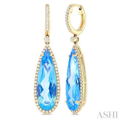 23x7 MM Pear Shape Blue Topaz and 3/8 Ctw Round Cut Diamond Halo Semi-Precious Earrings in 14K Yellow Gold