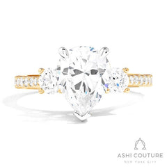 Bridal 3-Stone Diamond Pear Semi-Mount Engagement Ring With Round Side Diamonds in Yellow and White Gold