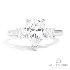 Bridal 3-Stone Pear Semi-Mount Engagement Ring With Round Side Diamonds in White Gold