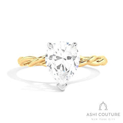 Bridal Pear Twisted Semi-Mount Engagement Ring in Yellow and White Gold