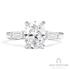 Bridal 3-Stone Oval Semi-Mount Engagement Ring With Tapered Baguette Side Diamonds in White Gold